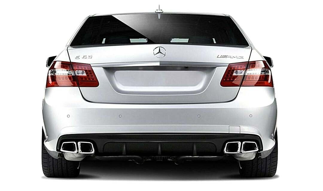 Mercedes-Benz car with chrome exhaust tips on a white background