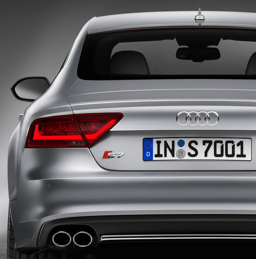Audi car with a visible license plate on a dark background